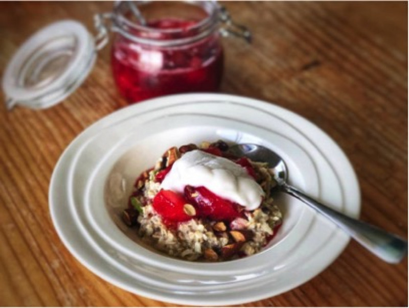 bircher muesli served with spiced poached plums