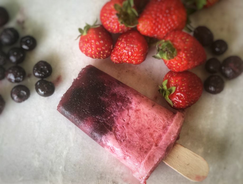 blueberry and cinnamon kombucha and strawberry yoghurt popsicles