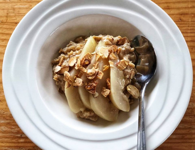 cardamom and cinnamon rice pudding served with citrus poached pears