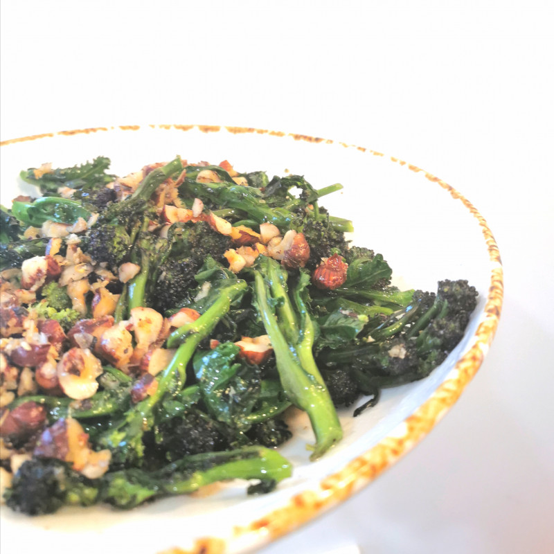 fried broccolini with hazelnuts