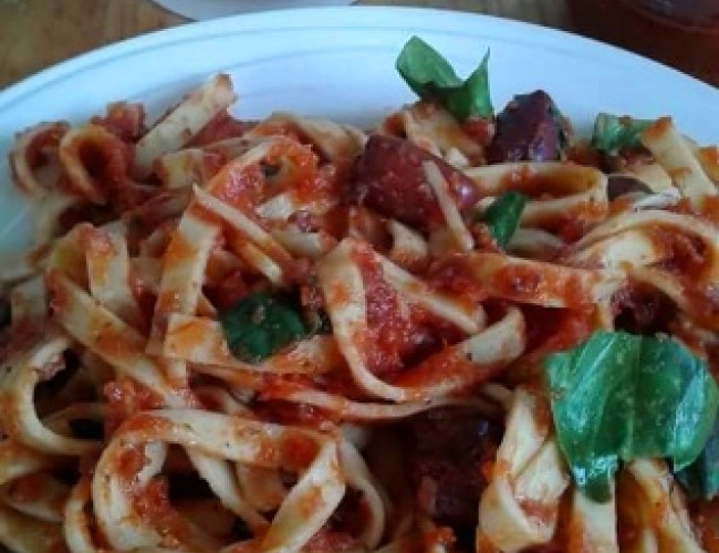 garlic infused pasta with fresh tomato sauce and olives