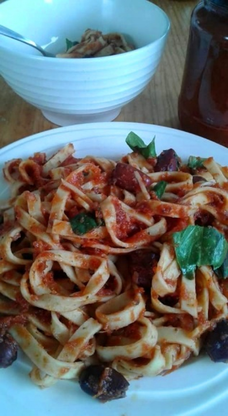 garlic infused pasta with fresh tomato sauce and olives