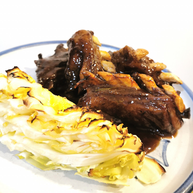 glazed lamb brisket with baked cabbage