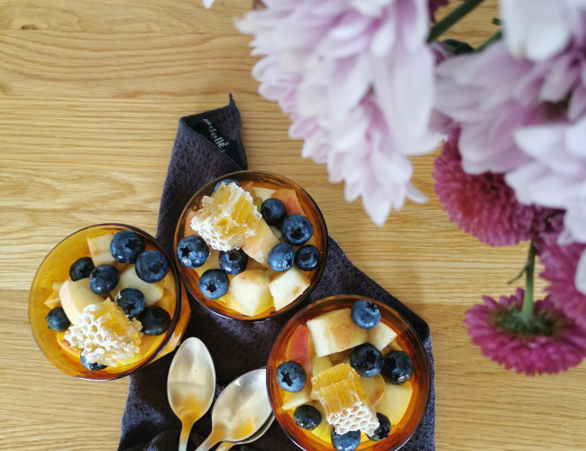 honey mousse with heritage wiggins peaches and blueberries