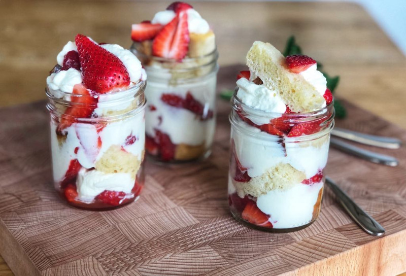 mint and lime syrup soaked brioche with whipped coconut cream and strawberries