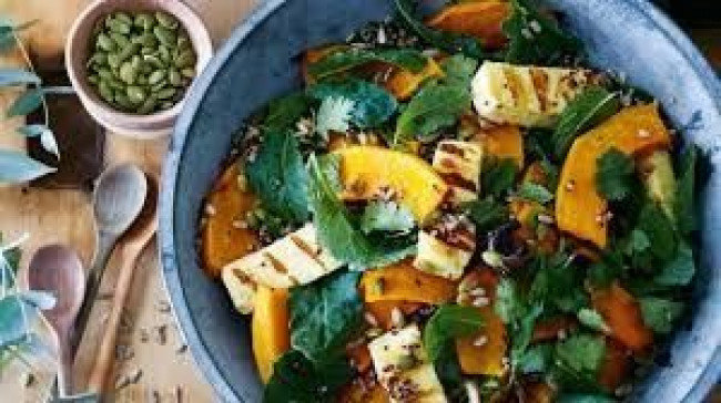 pumpkin kale hazelnut salad with grilled evansdale curd and tahini dressing