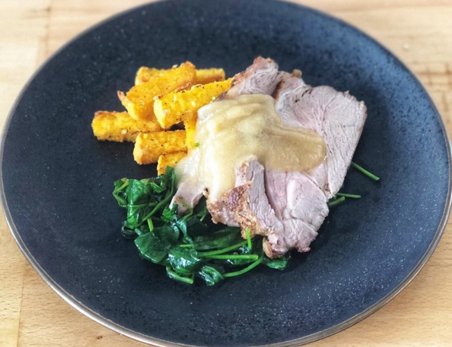 roast pork ribeye with smoked apple sauce and polenta chips