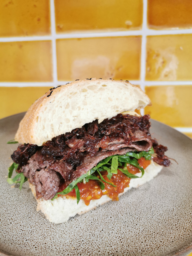 steak sandwich with caramalised red onion and kasundi