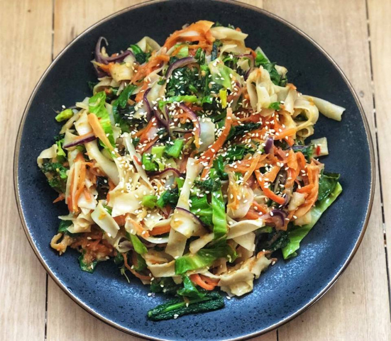 stir fry vegetables with peanut sauce and rice noodles