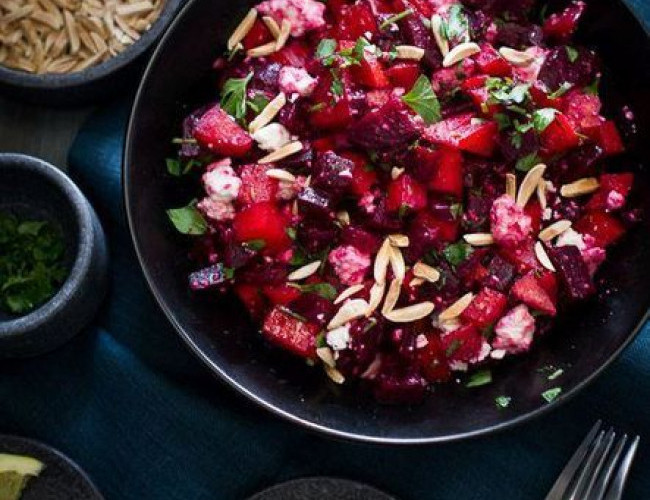 warm beet and red onion salad with toasted nuts and cheese curd